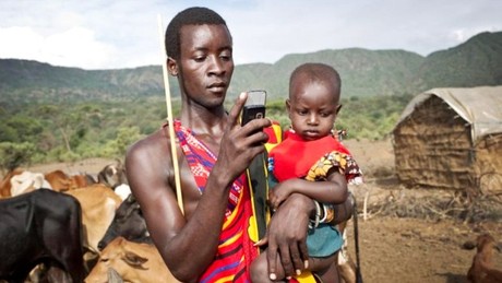 African Farmer with Mobile Internet Access