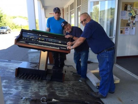 Donated Organ being Moved in by 3 Volunteers