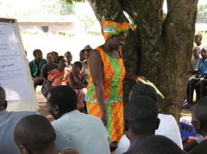 Resty Namubiru, when she was an African Rural University student, working with villagers to elicit their visions and current reality. 