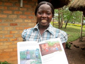 Safira shows off the book she co-authored. It's the first book her family owned!