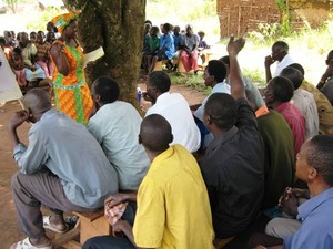 Resty Namubiru leading a community visioning workshop 